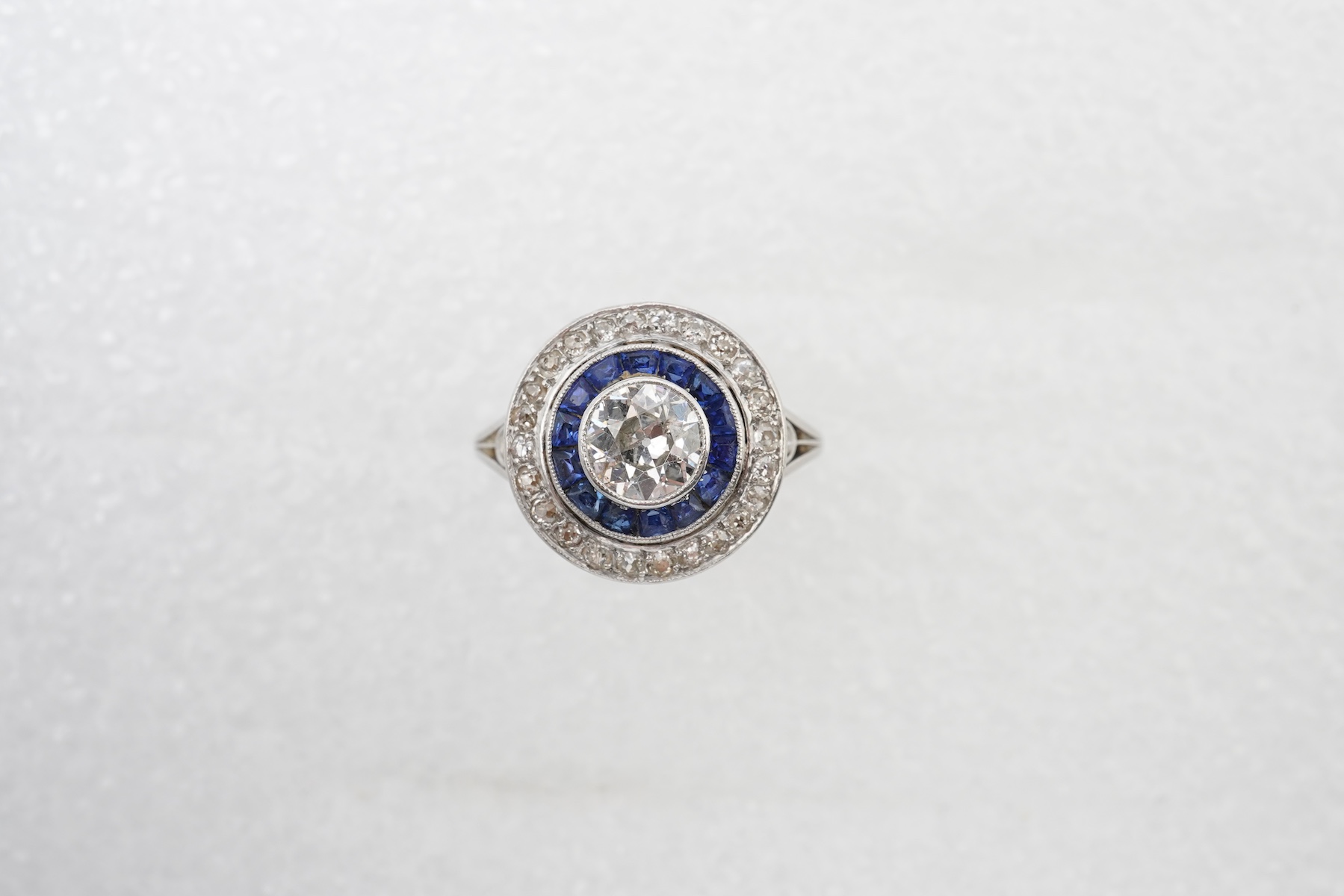 A diamond and sapphire 'target' ring